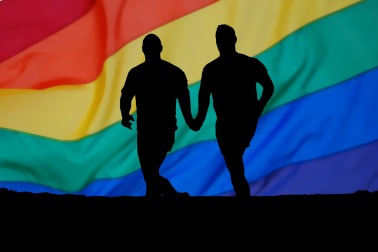 gay men partner and rainbow flag